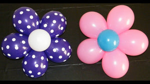 Make your own balloon flower decorations to set on the tables or hang on the wall
