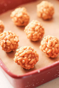 This snack recipe is on constant repeat in our kitchen! Chewy delicious and only FOUR ingredients, these Healthy Peanut Butter Rice Crispy Balls are made WITHOUT powdered sugar making them an ideal treat for toddler and adults alike