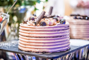 If you’re looking for a royal color scheme for your wedding, consider using purple and grey