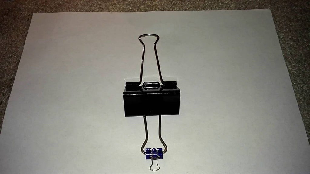 this phone stand is made with paper clips ..